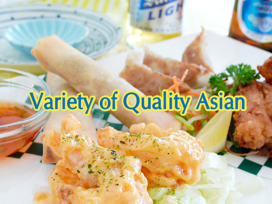 Asian appetizer combo platter with karaage, prawn mayo, spring rolls and wontons