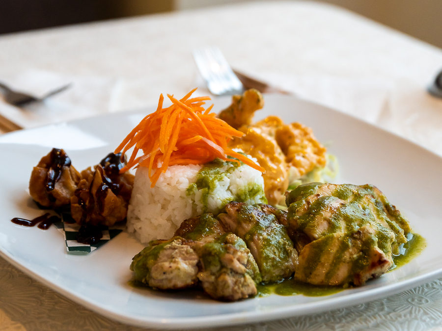 Grilled Thai coconut-curry chicken combo with rice and sides